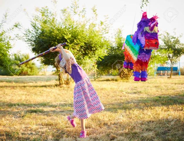 hitting-a-pinata-celebrating-a-birthday-.jpg